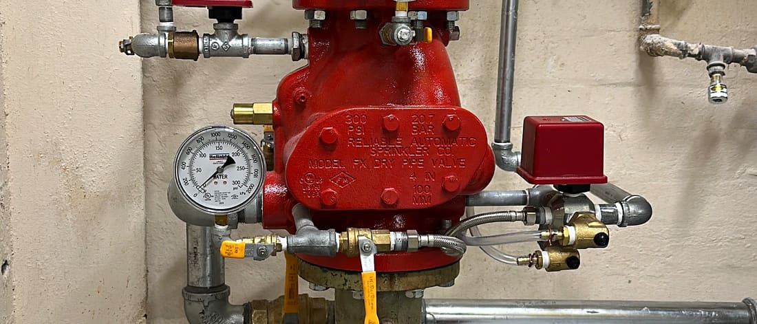 A sprinkler alarm valve set in a plant room