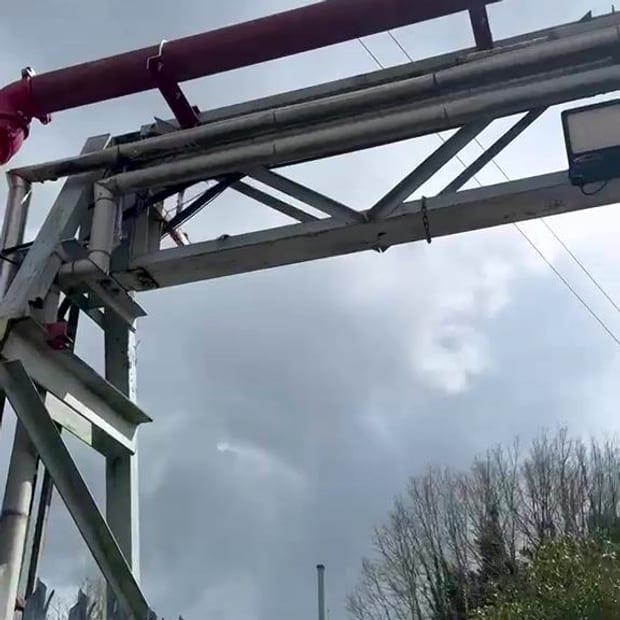 Sprinkler pipe gantry against the sky