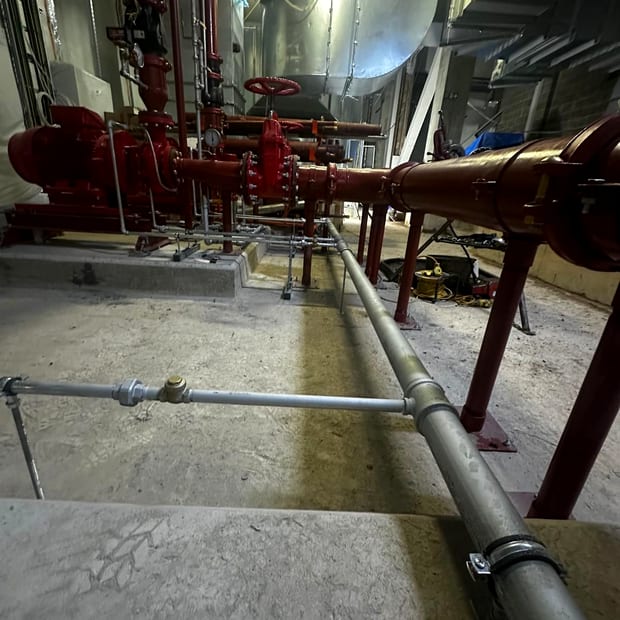 Fire pump and tank connection in a pump house